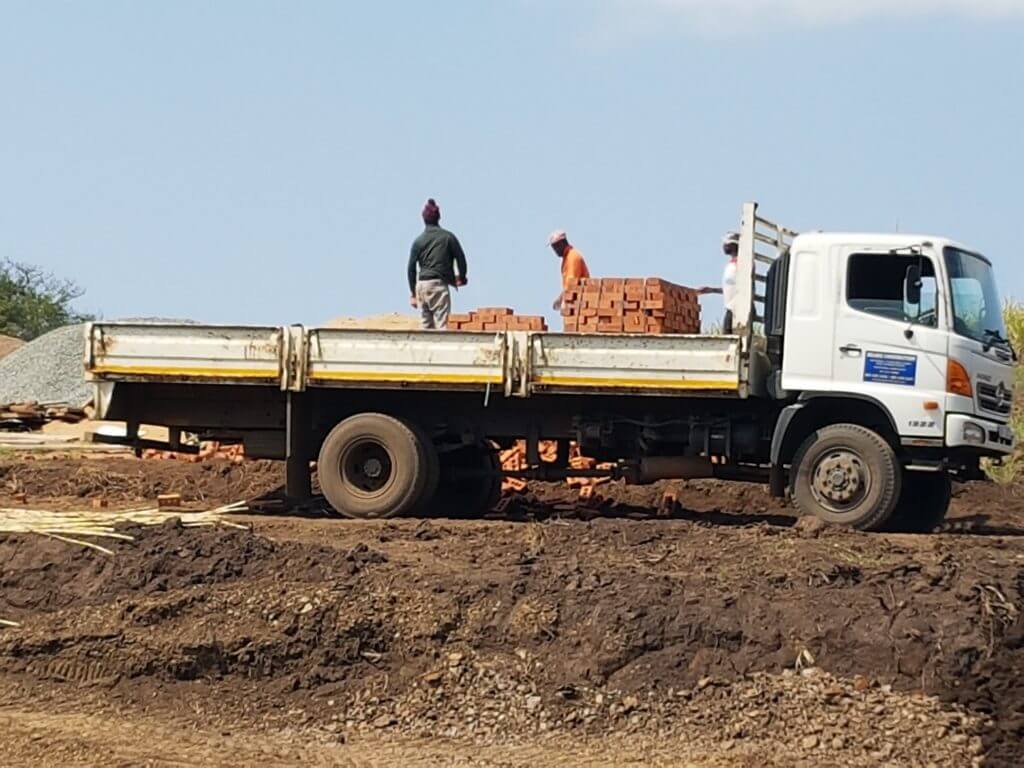 For transport of building materials, sand and stone, topsoil and transport of material from site clearing